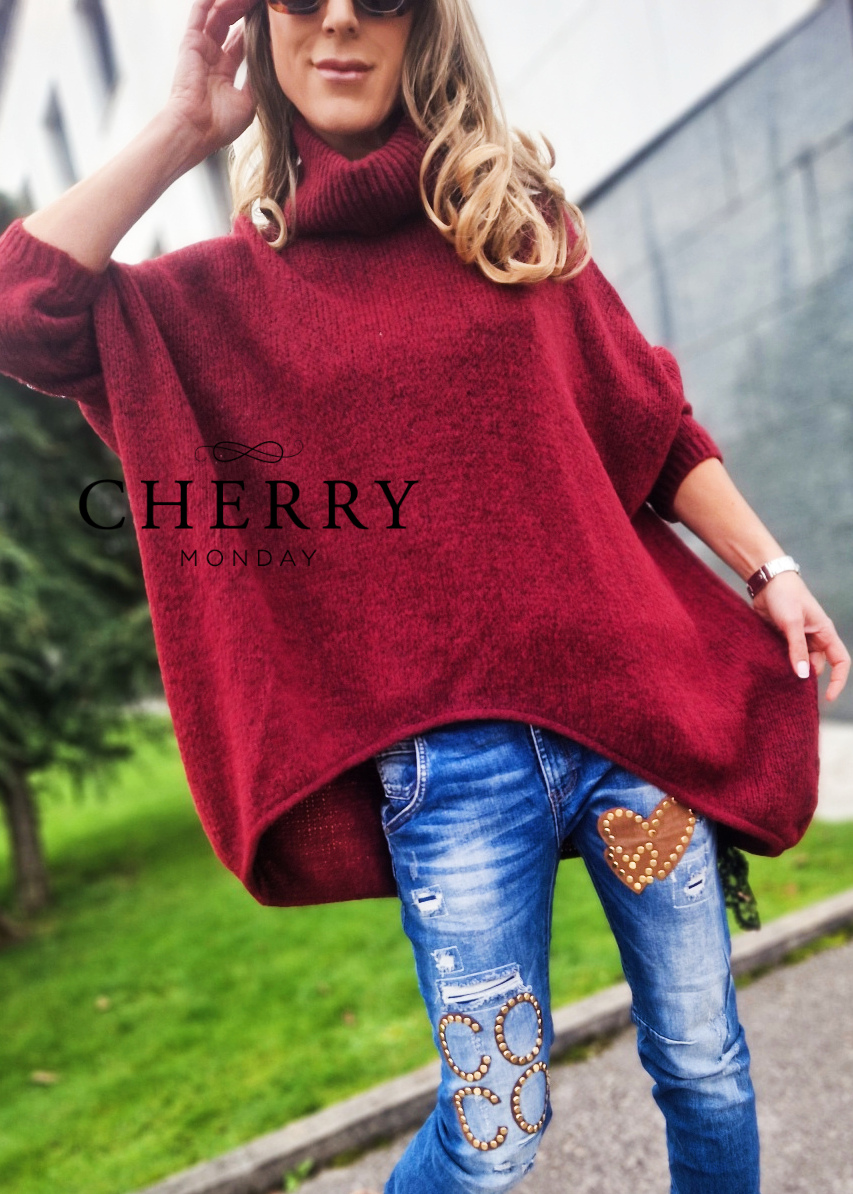 Asimetričen pulover širokega kroja