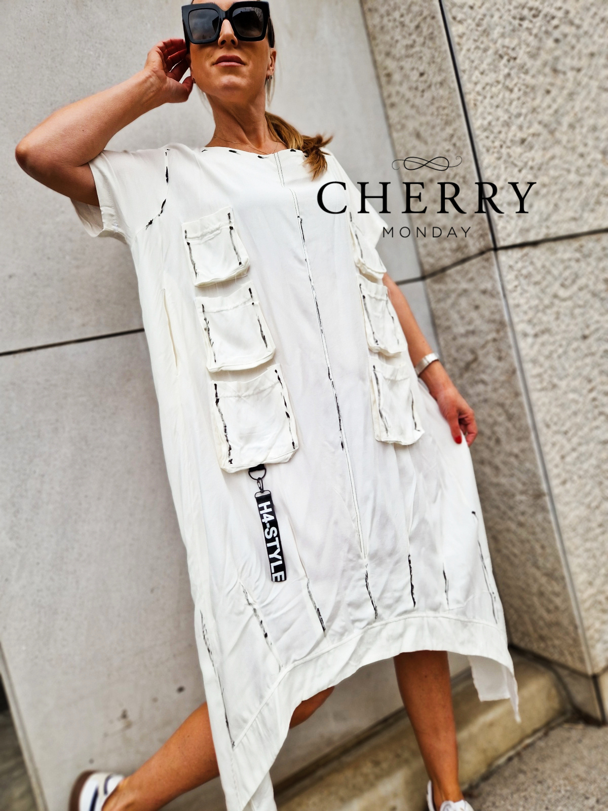 Midi obleka z našitimi žepi