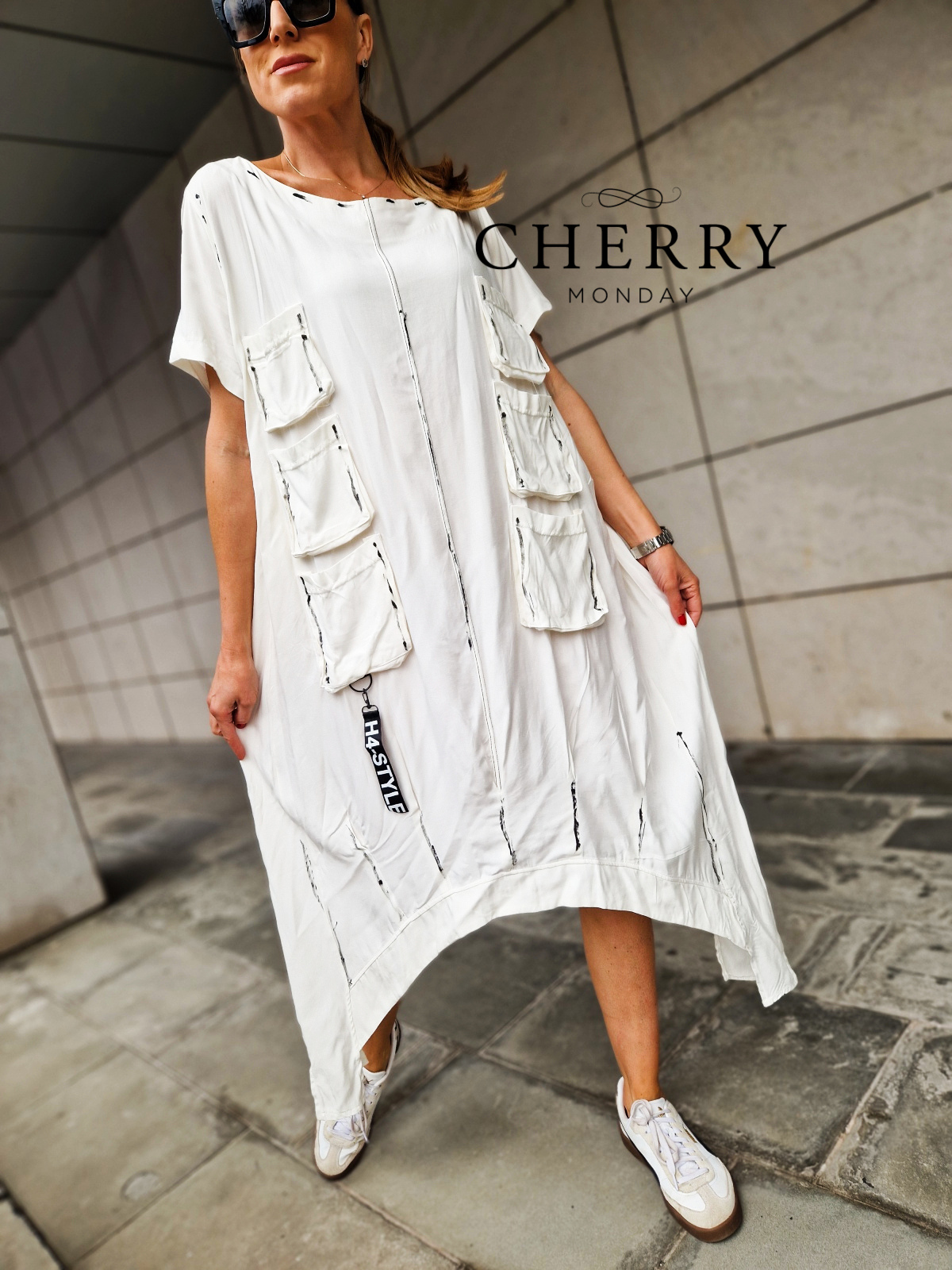 Midi obleka z našitimi žepi