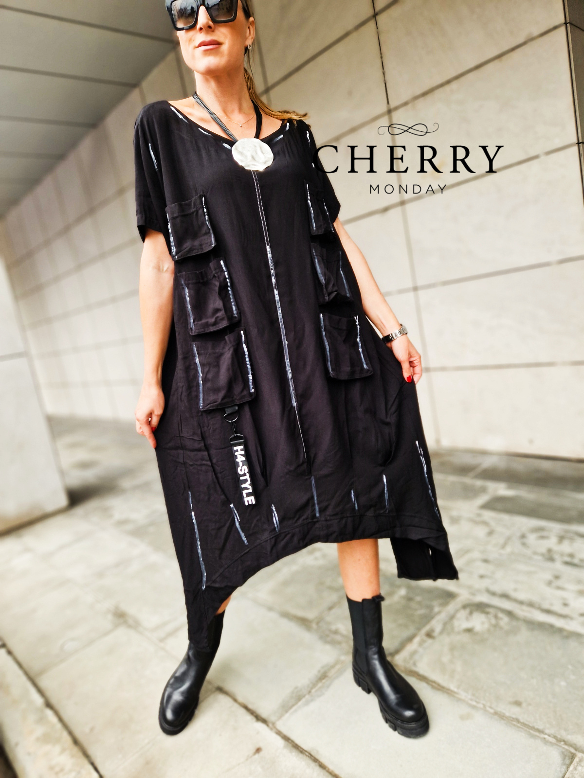 Midi obleka z našitimi žepi