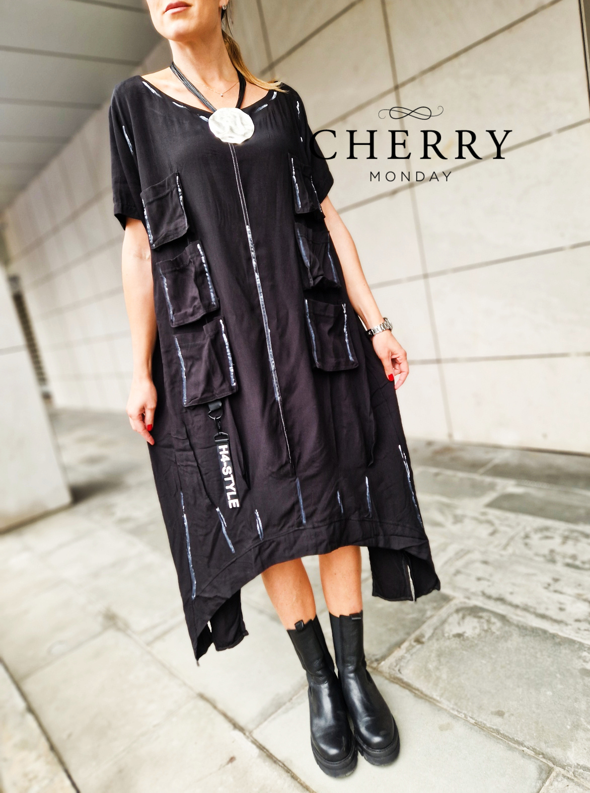 Midi obleka z našitimi žepi