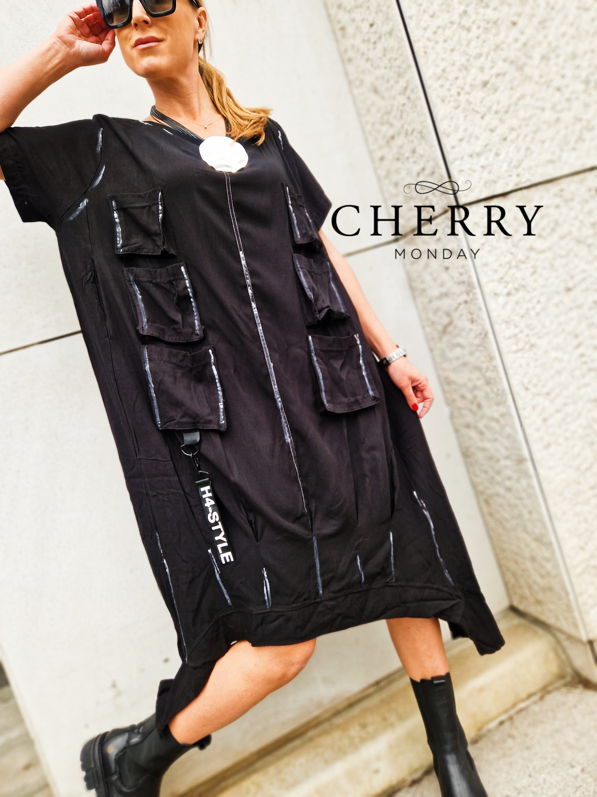 Midi obleka z našitimi žepi