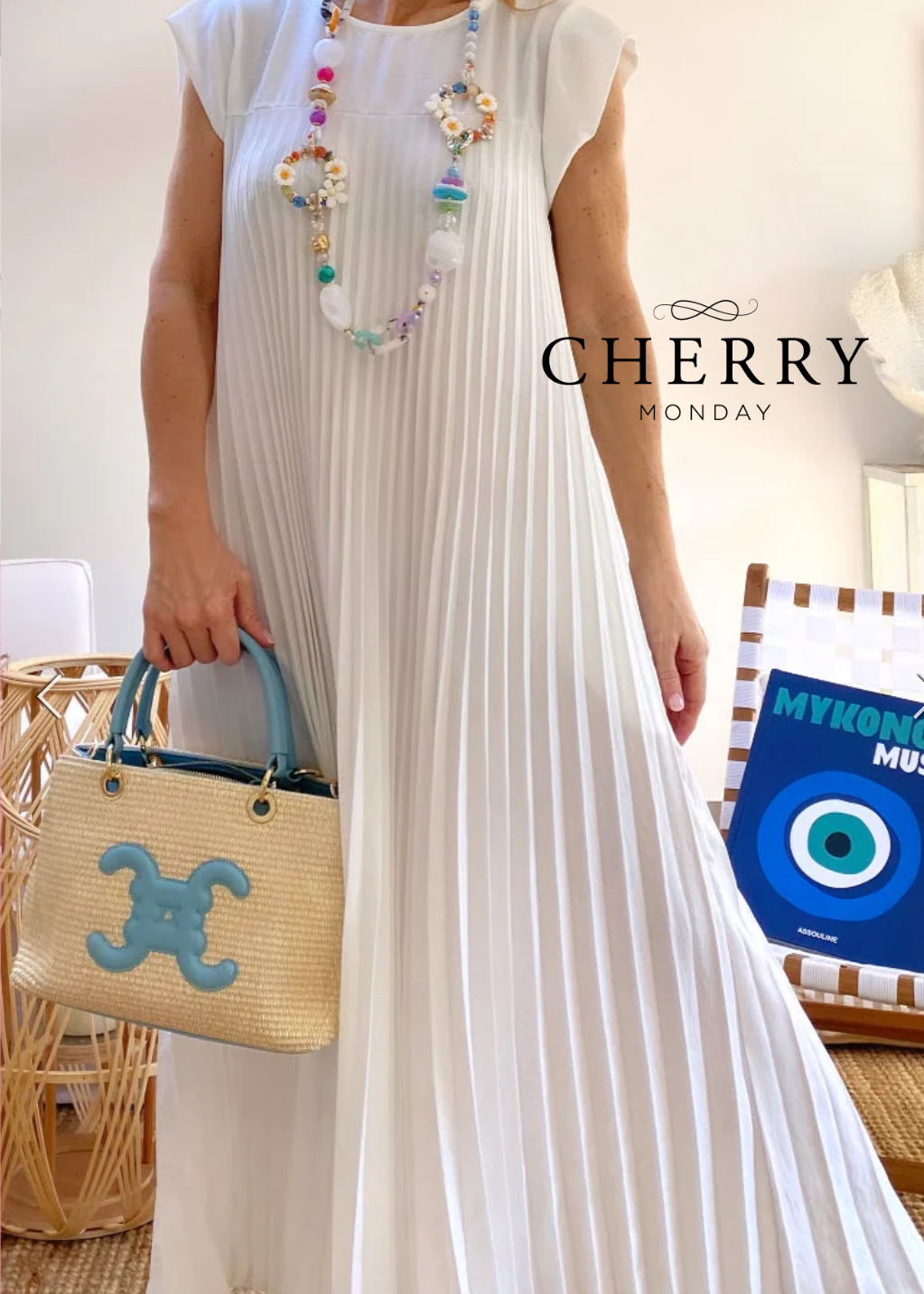 Plisirana maxi obleka brez rokavov