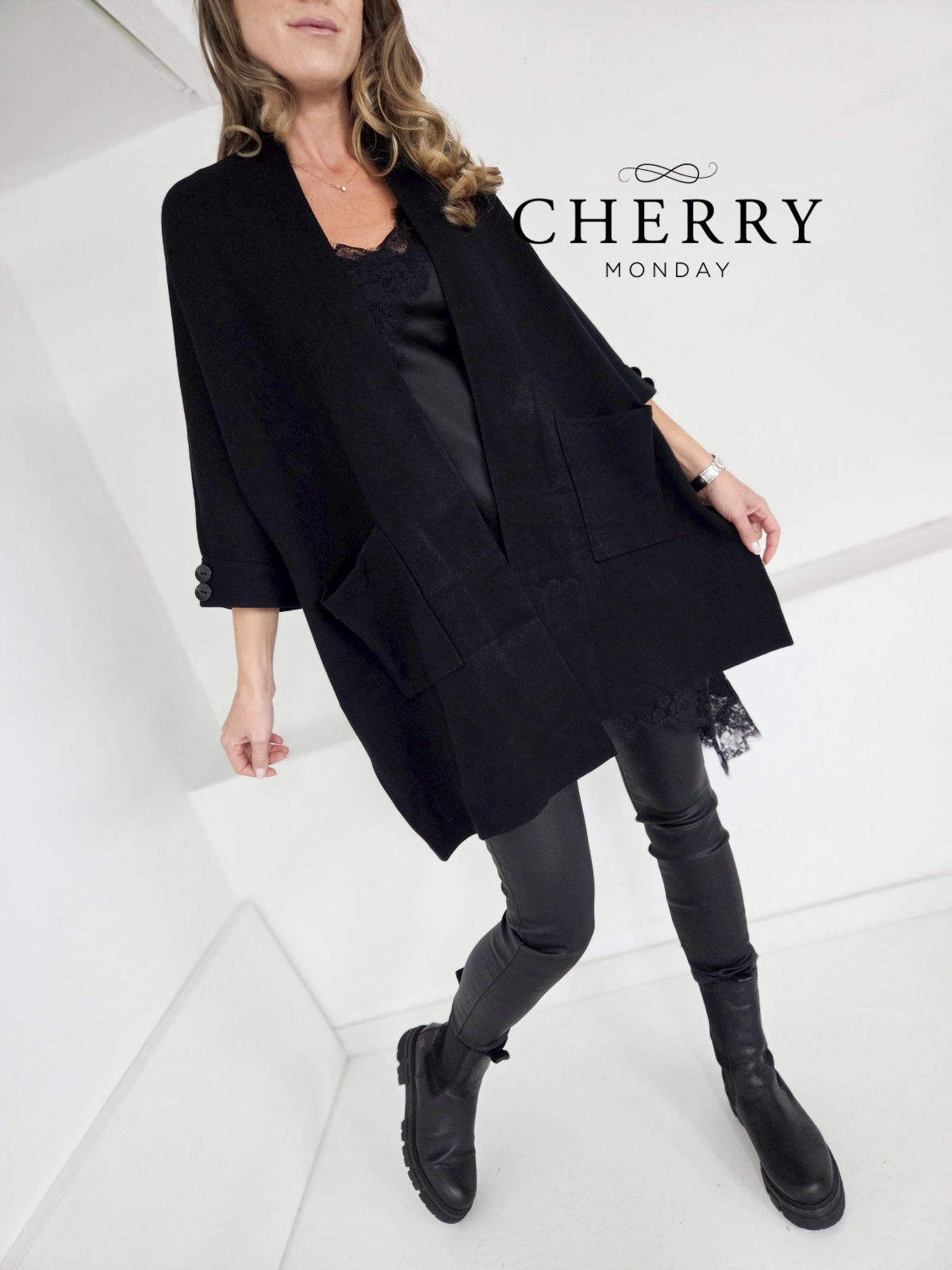 Vrhunska pletena jopa z žepi