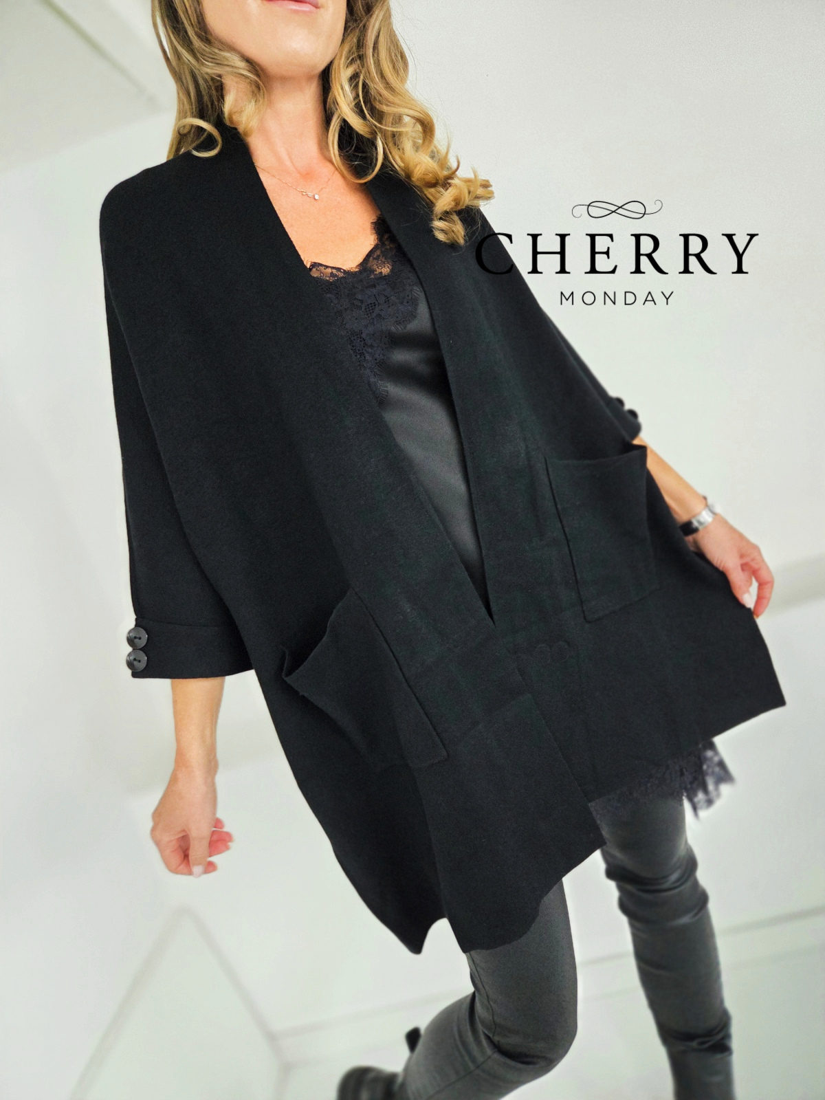 Vrhunska pletena jopa z žepi