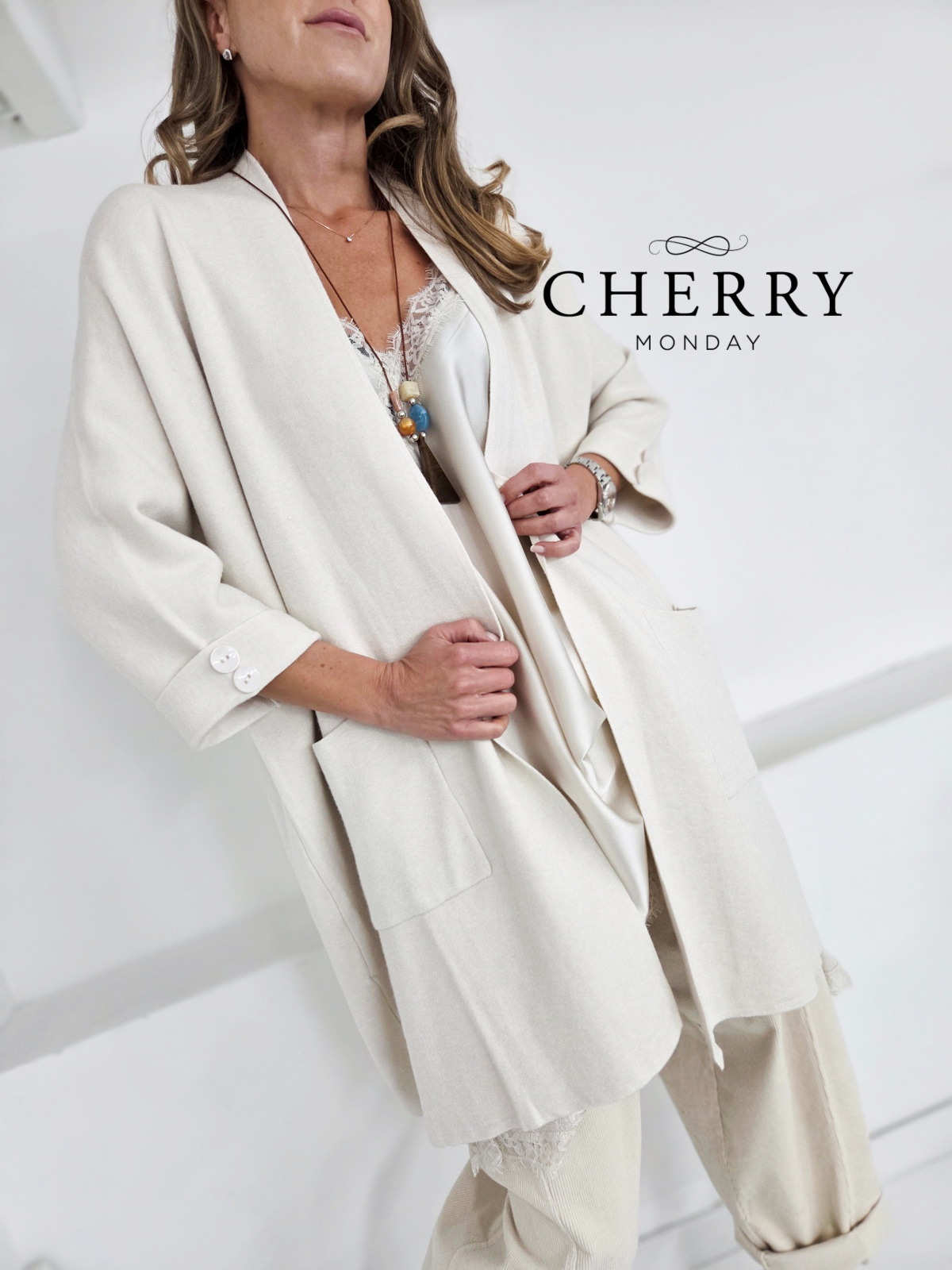 Vrhunska pletena jopa z žepi