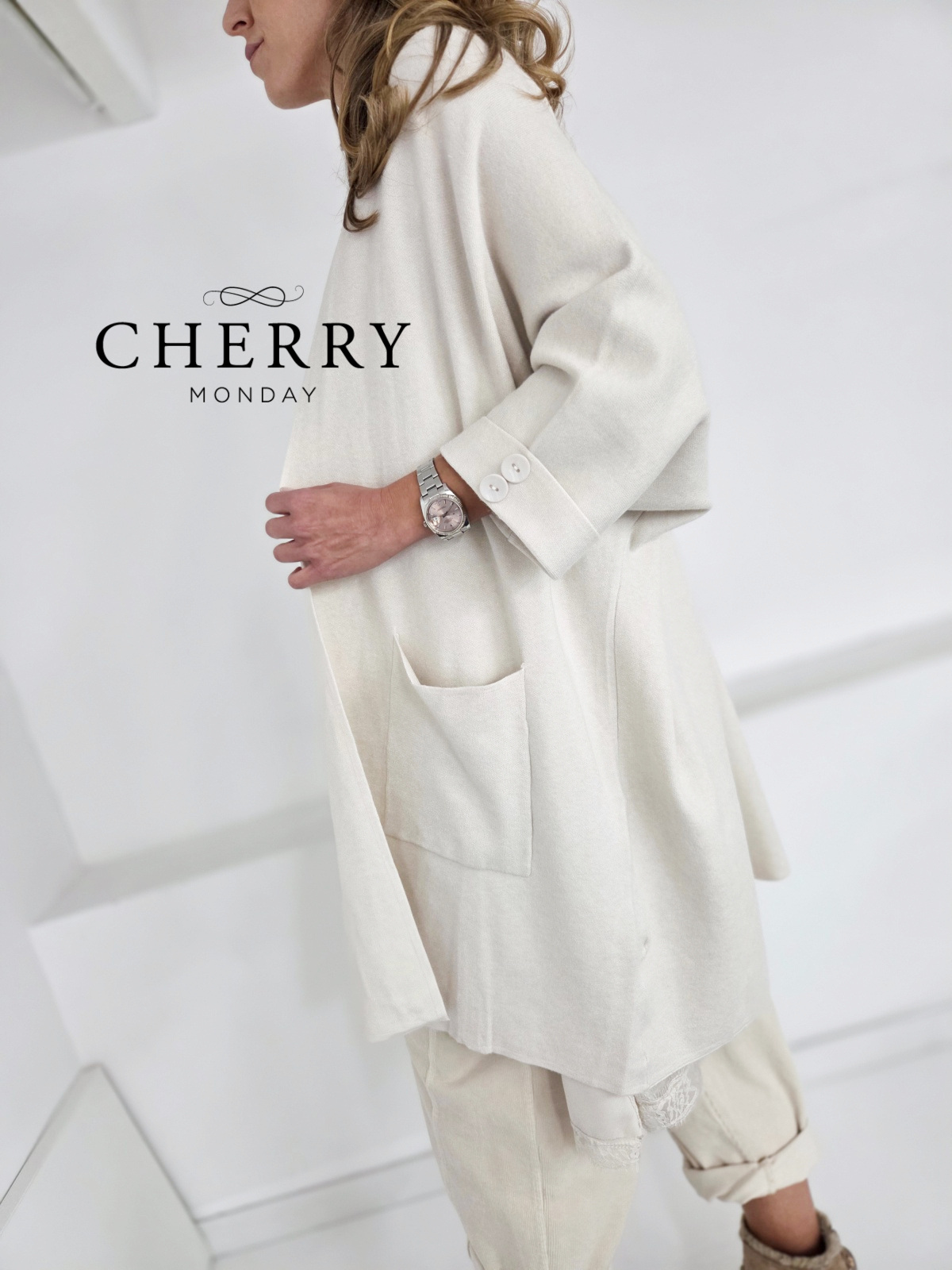 Vrhunska pletena jopa z žepi