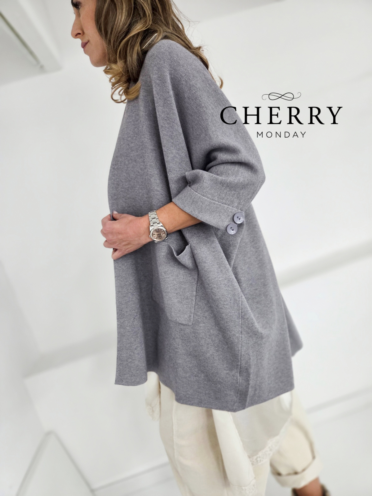 Vrhunska pletena jopa z žepi