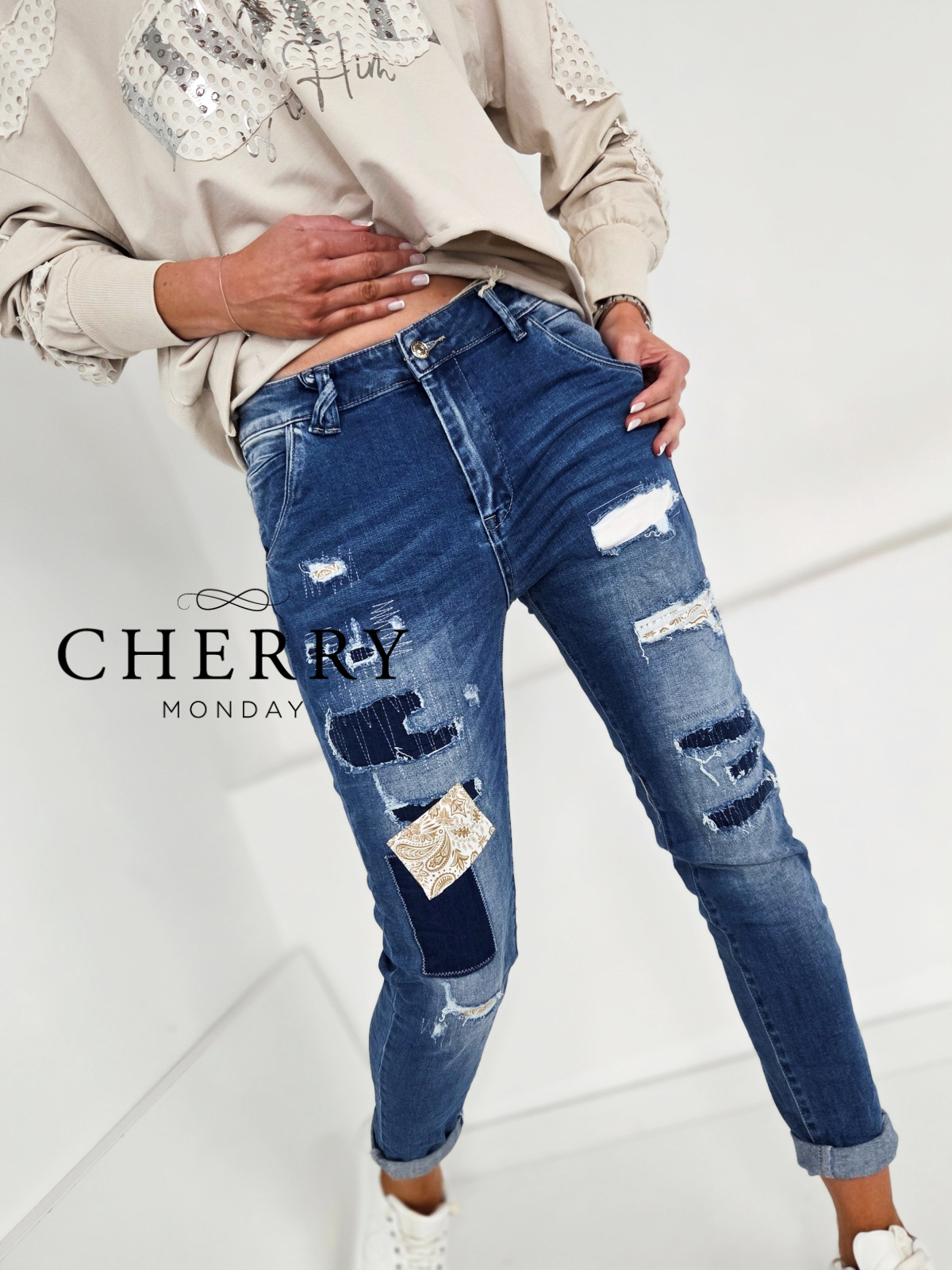 Jeans hlače z zaplatami