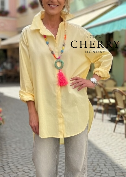 Ohlapna srajca s podaljšanim zadnjim delom