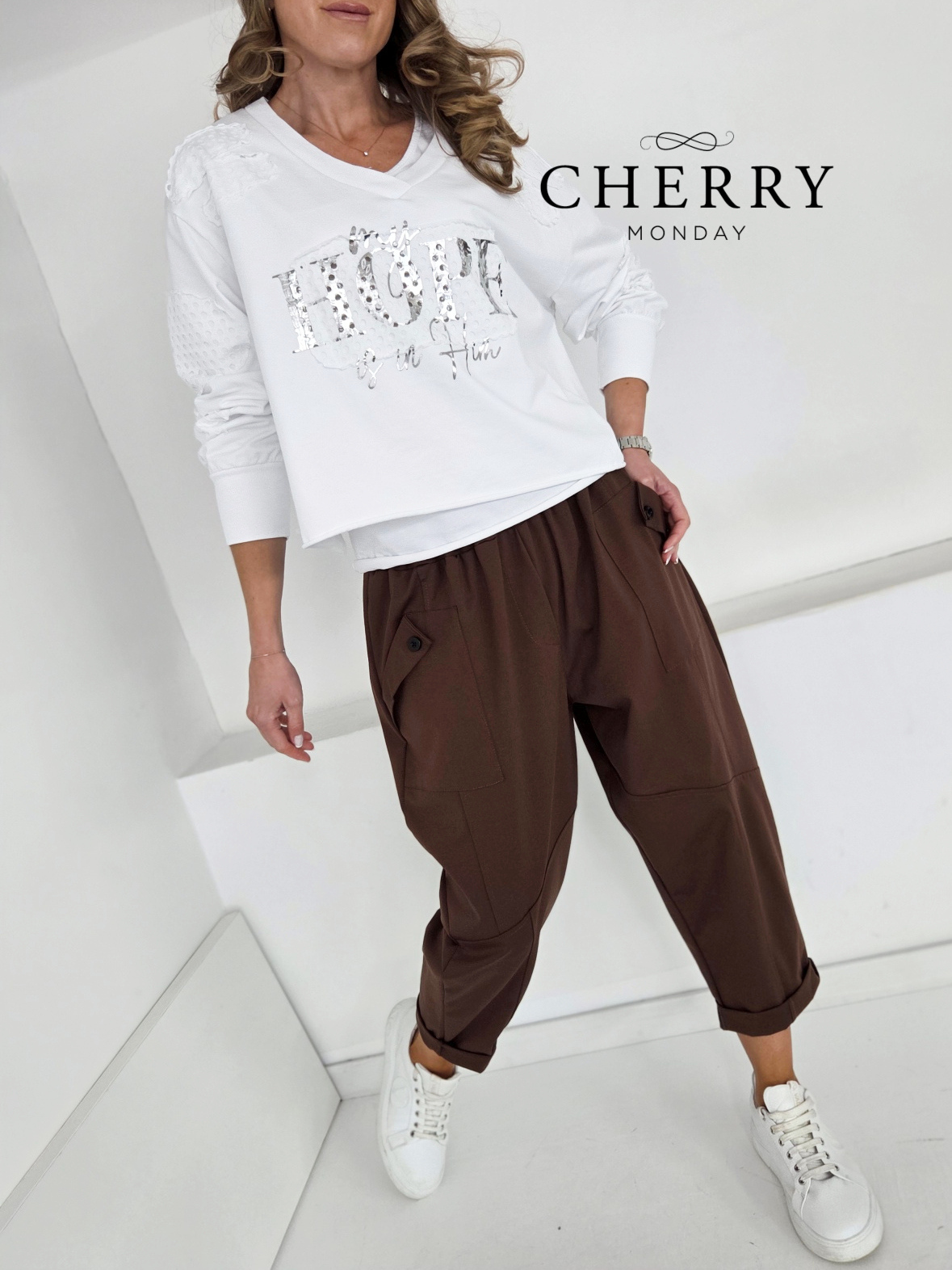 Sproščene hlače z žepi