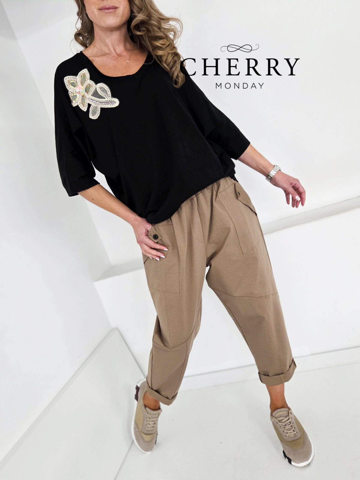 Sproščene hlače z žepi