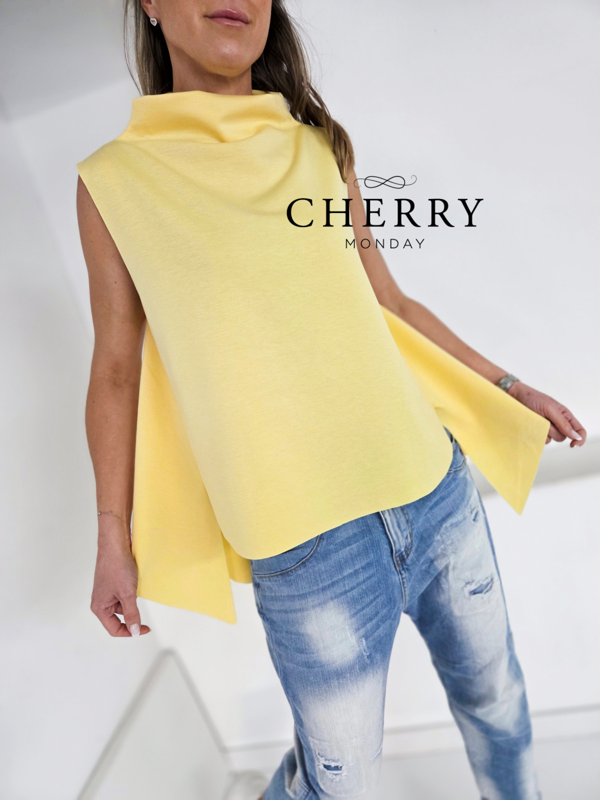 Asimetrični brezrokavnik