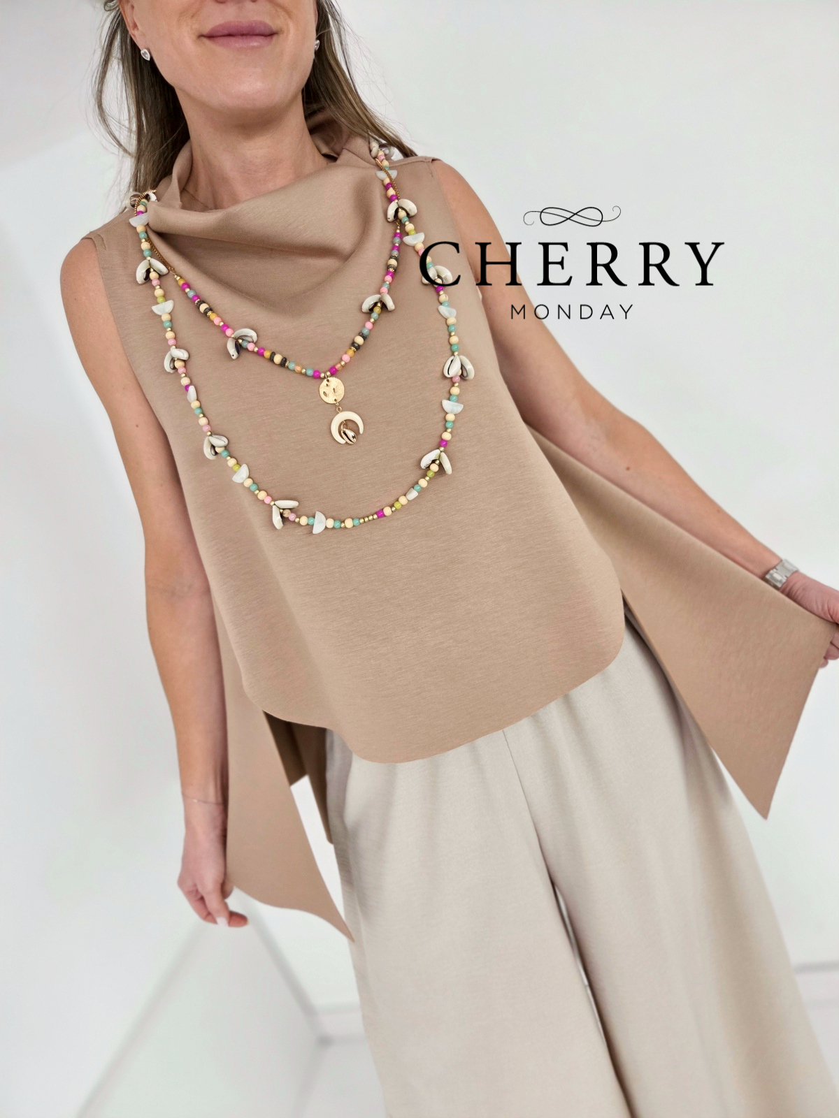 Asimetrični brezrokavnik