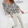 Bluza z volani in leopardjim vzorcem