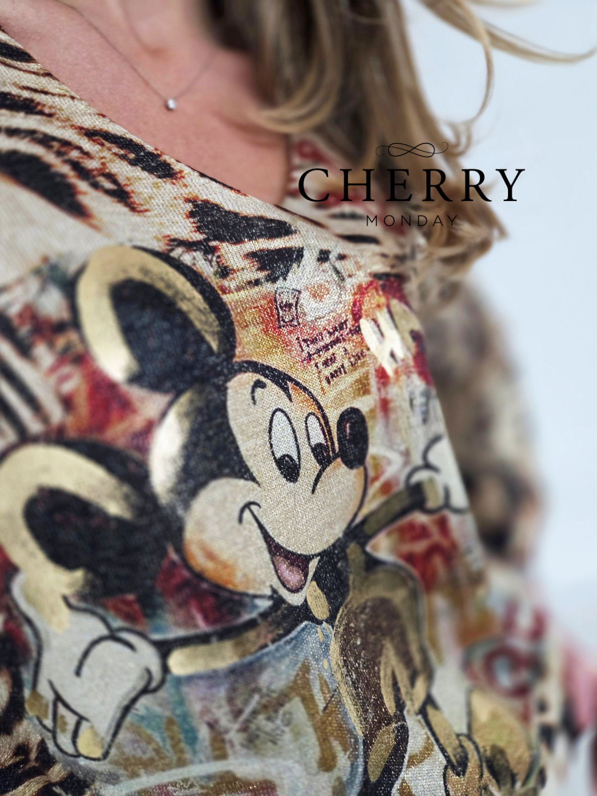 Tanjši pulover svetlečega videza Miki