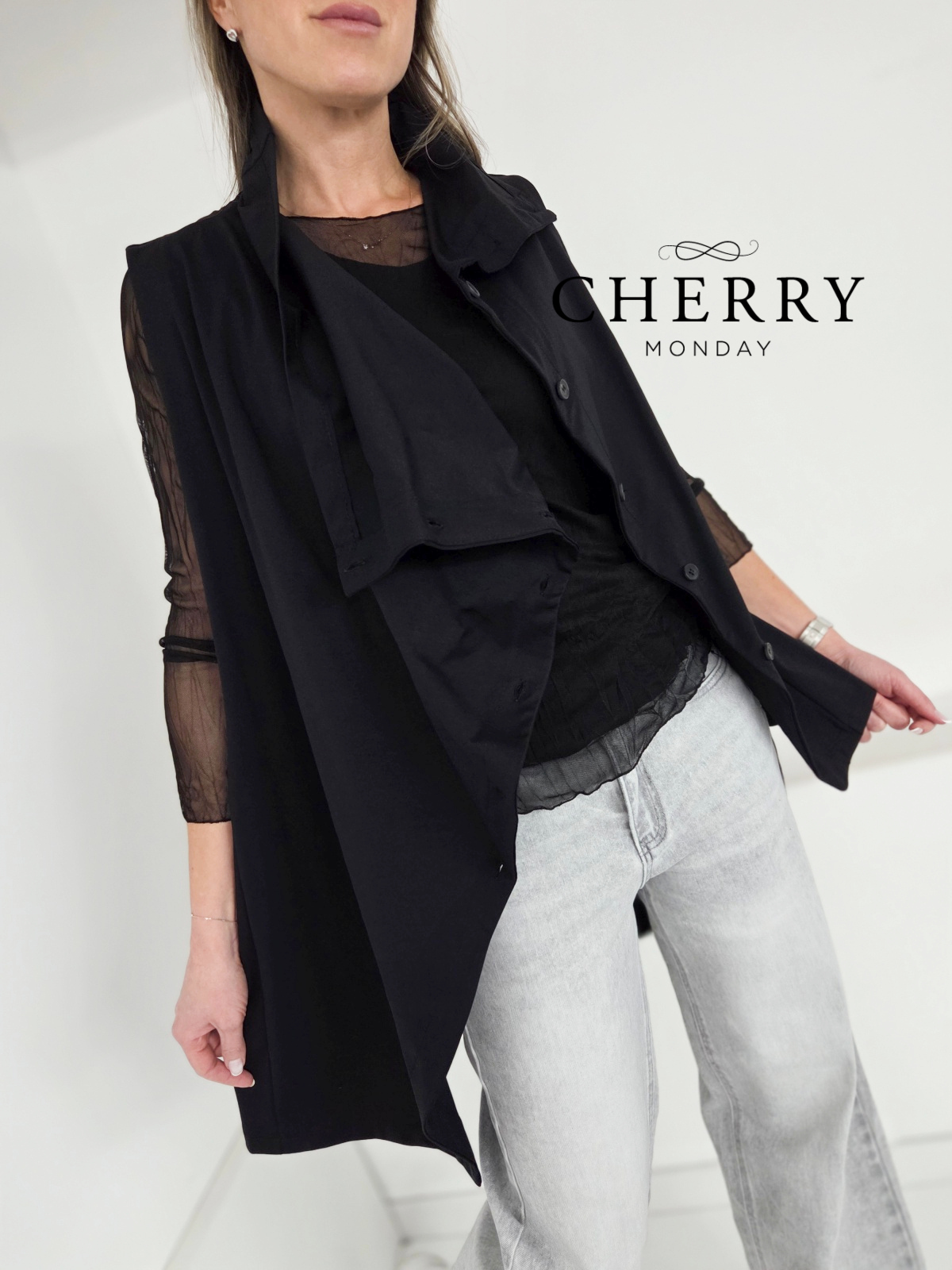 Modni asimetrični brezrokavnik