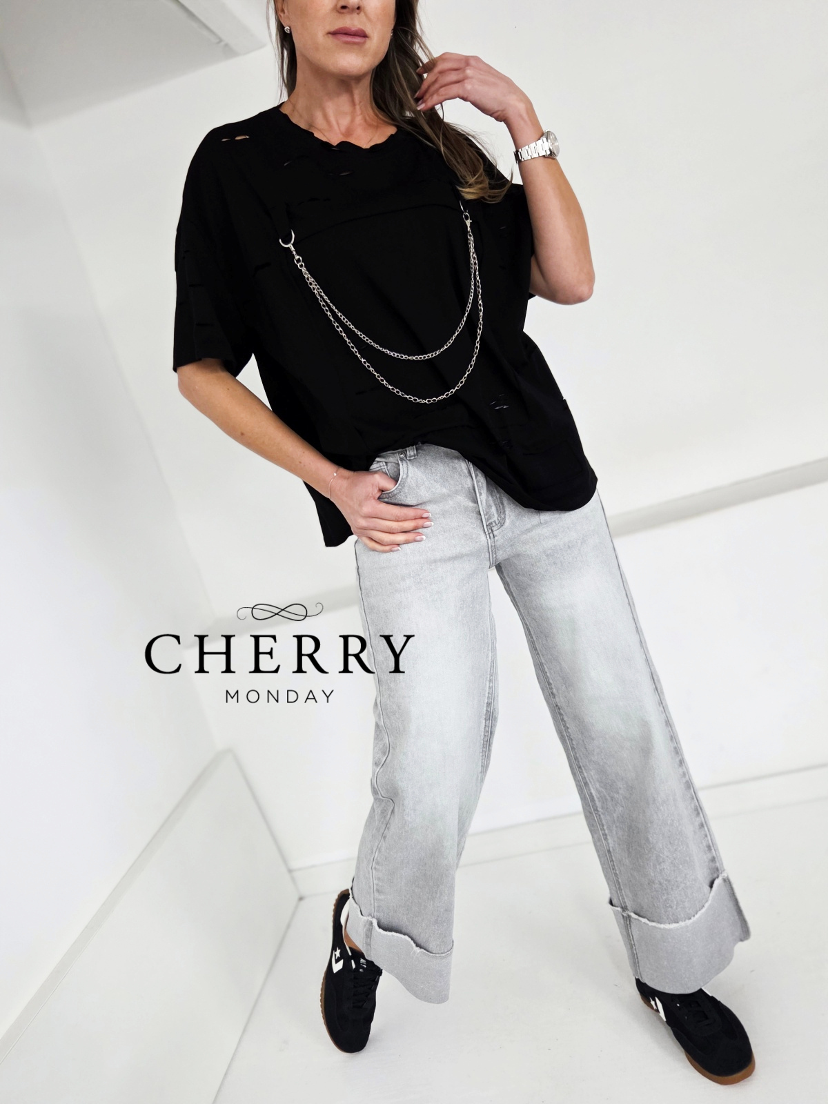 Sive jeans hlače z zavihanim robom