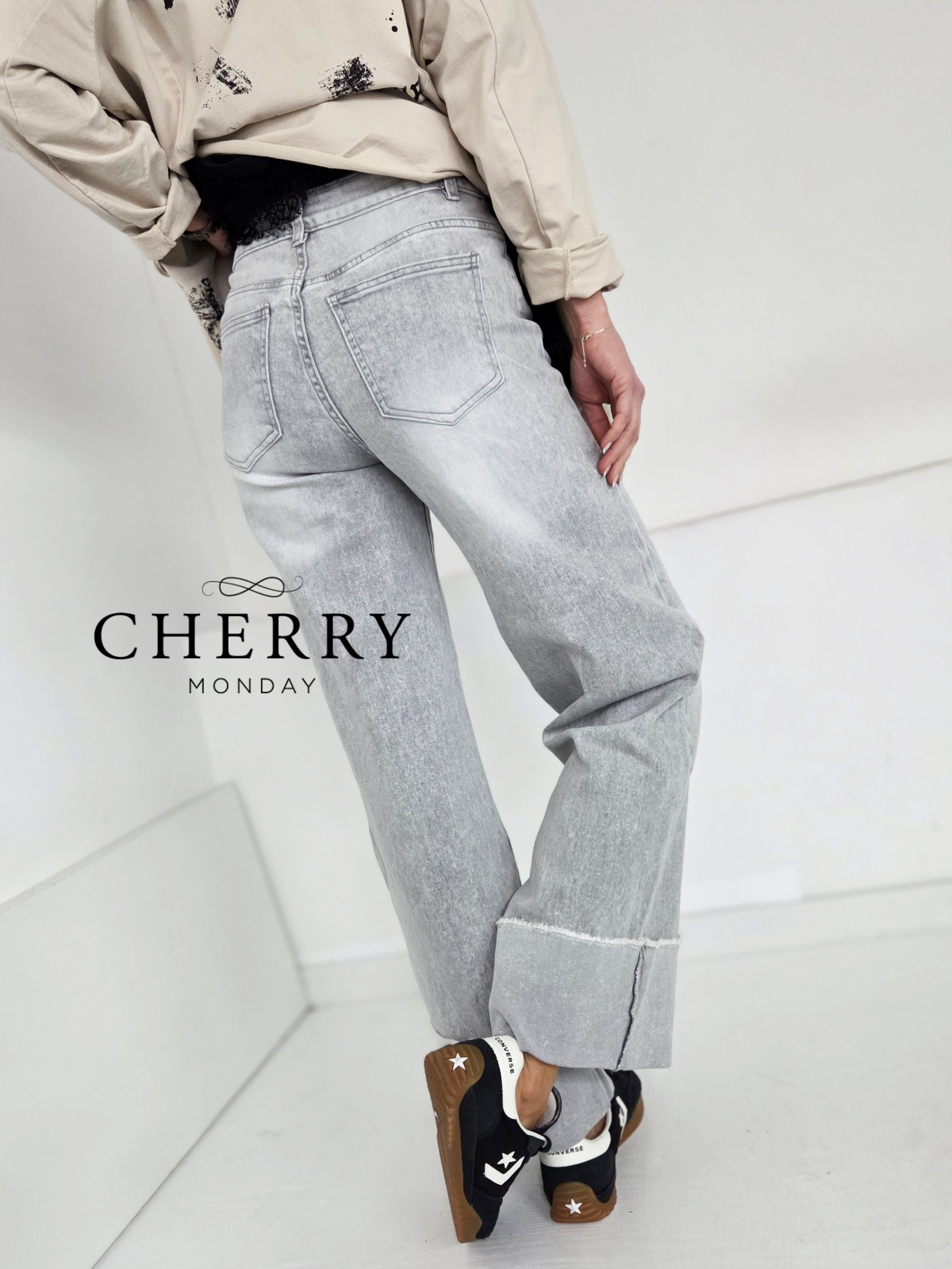 Sive jeans hlače z zavihanim robom