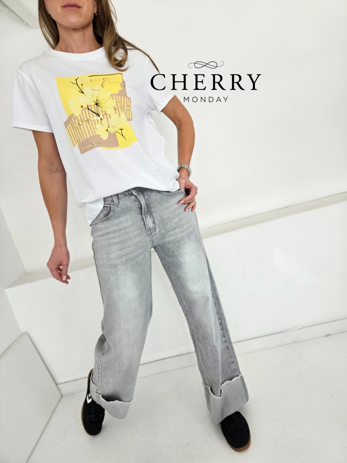 Sive jeans hlače z zavihanim robom