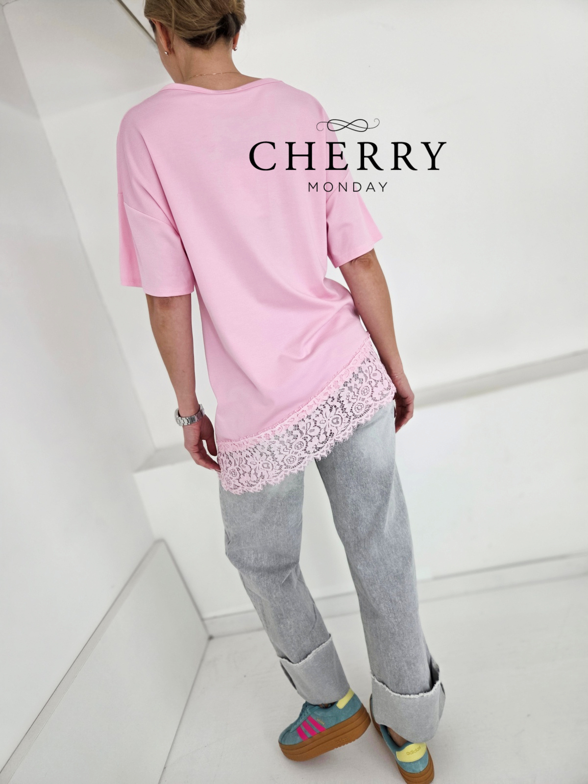 Sive jeans hlače z zavihanim robom