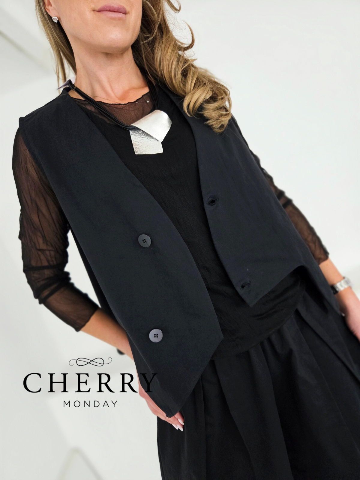 Modni asimetrični telovnik