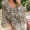 Bluza z volani in leopardjim vzorcem