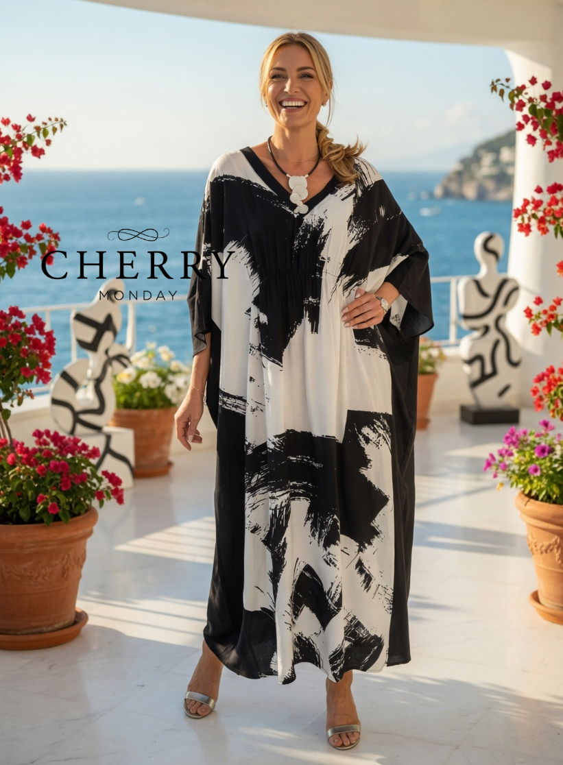 Lahkotna obleka metuljastega kroja