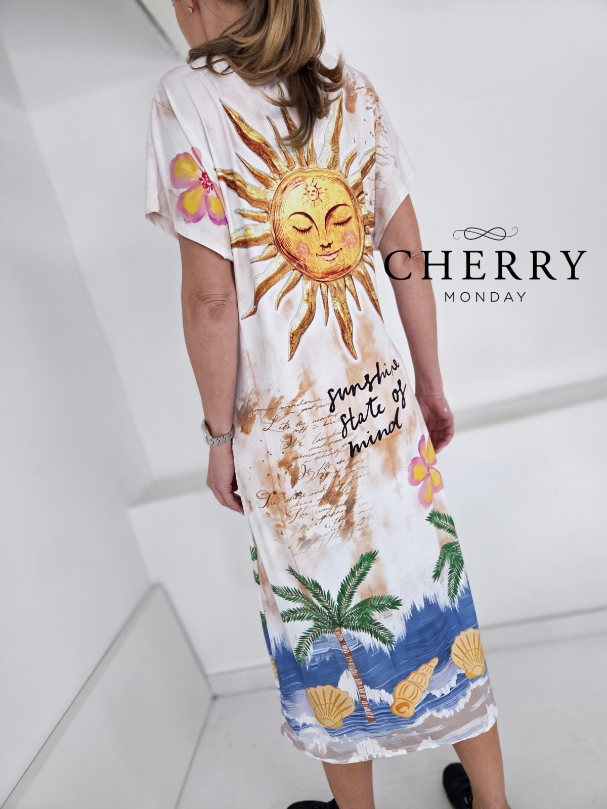 Obleka s potiskom in pentljo