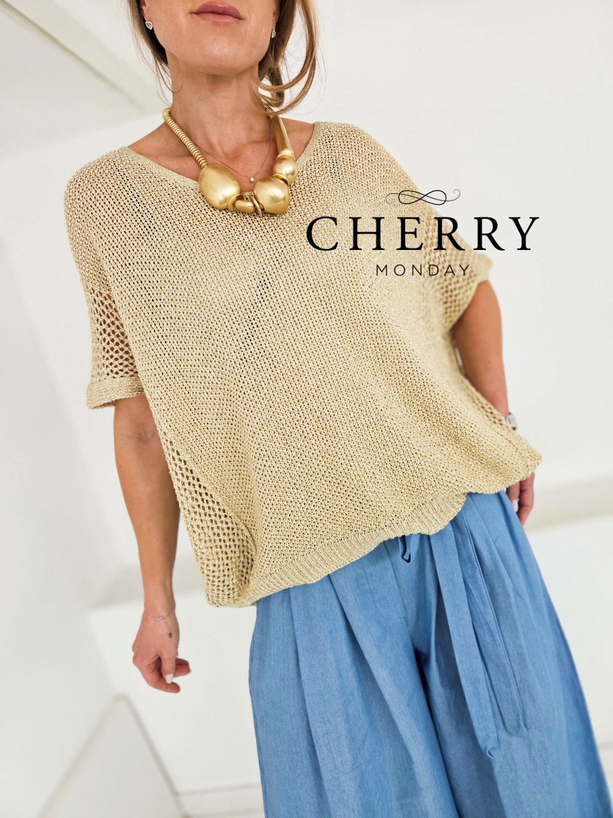 Zlat mrežast pulover