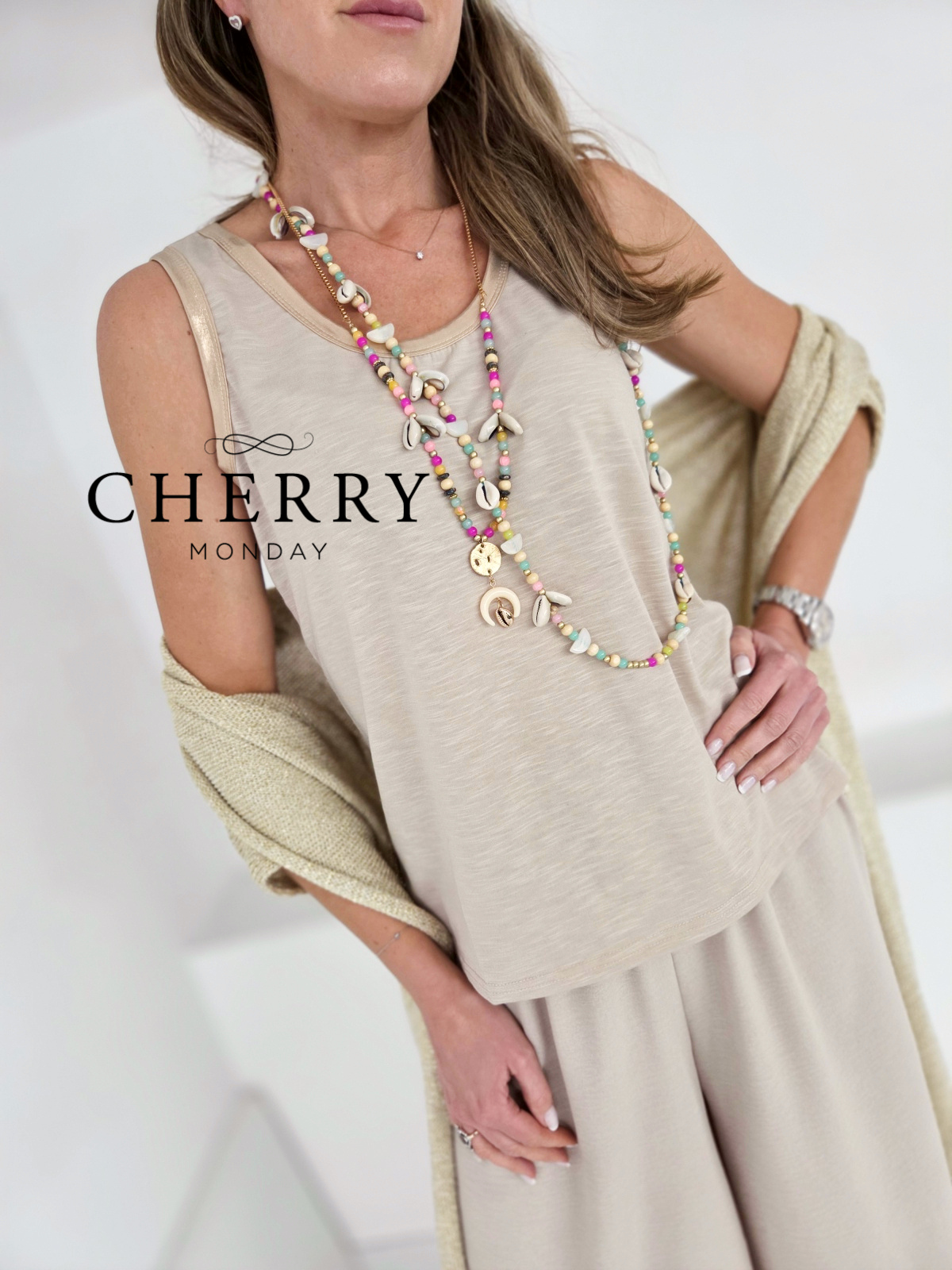 Zlat top brez rokavov