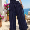 Široke plus size hlače s pentljo