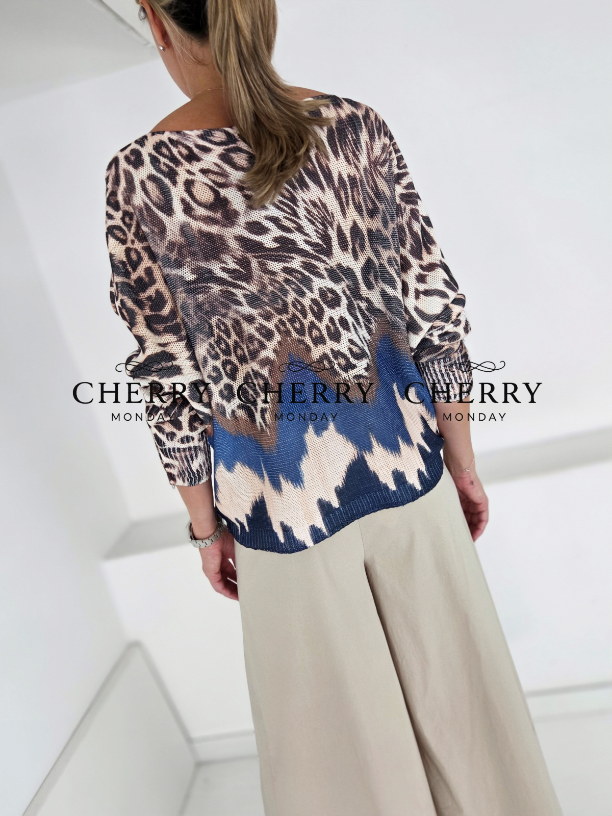Modni pulover leopardjega vzorca