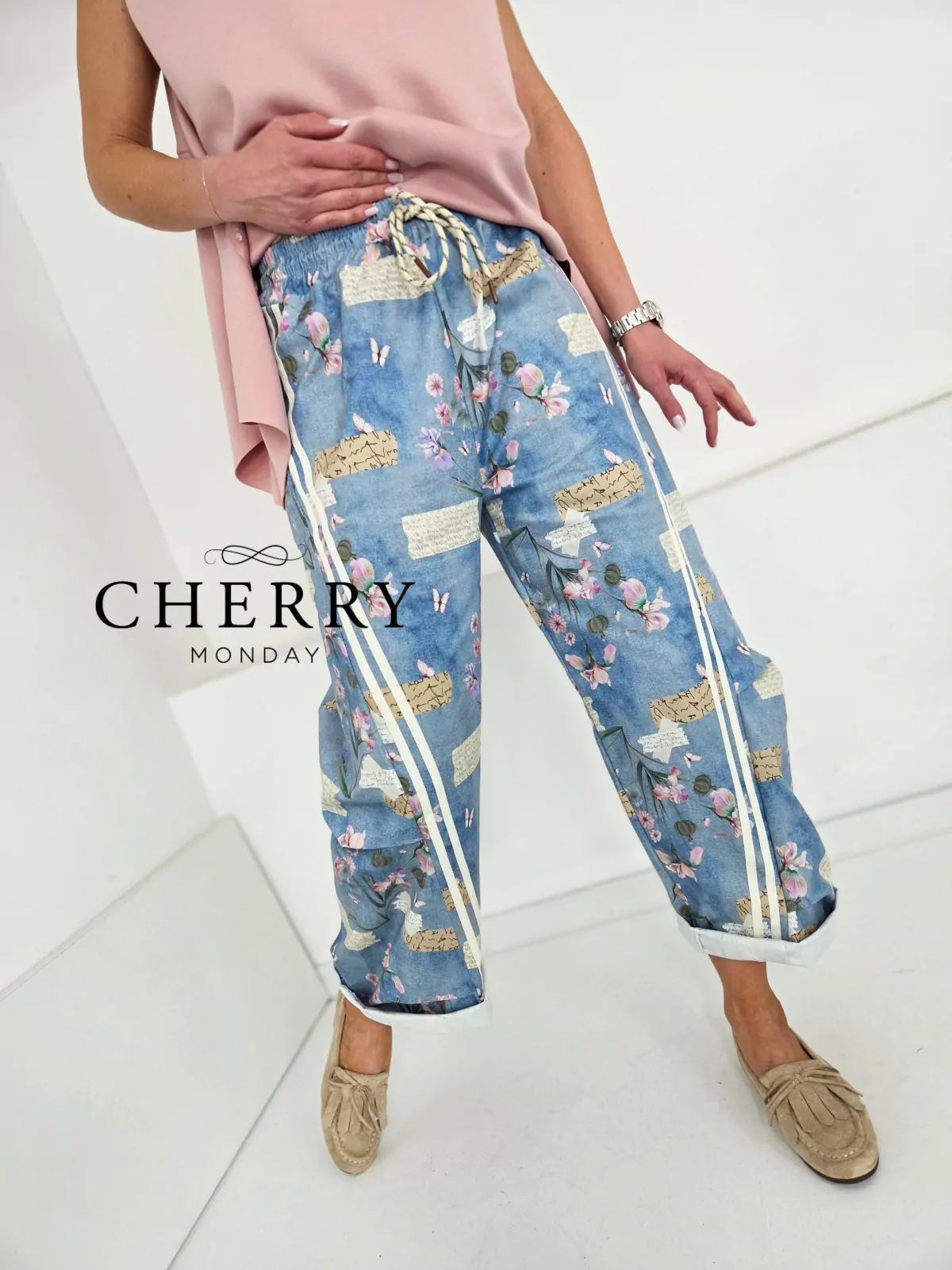 Svetle jeans hlače s cvetličnim potiskom